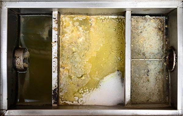 delaying grease interceptor cleaning can cause foul odors, backed-up plumbing, and expensive repairs in the kitchen